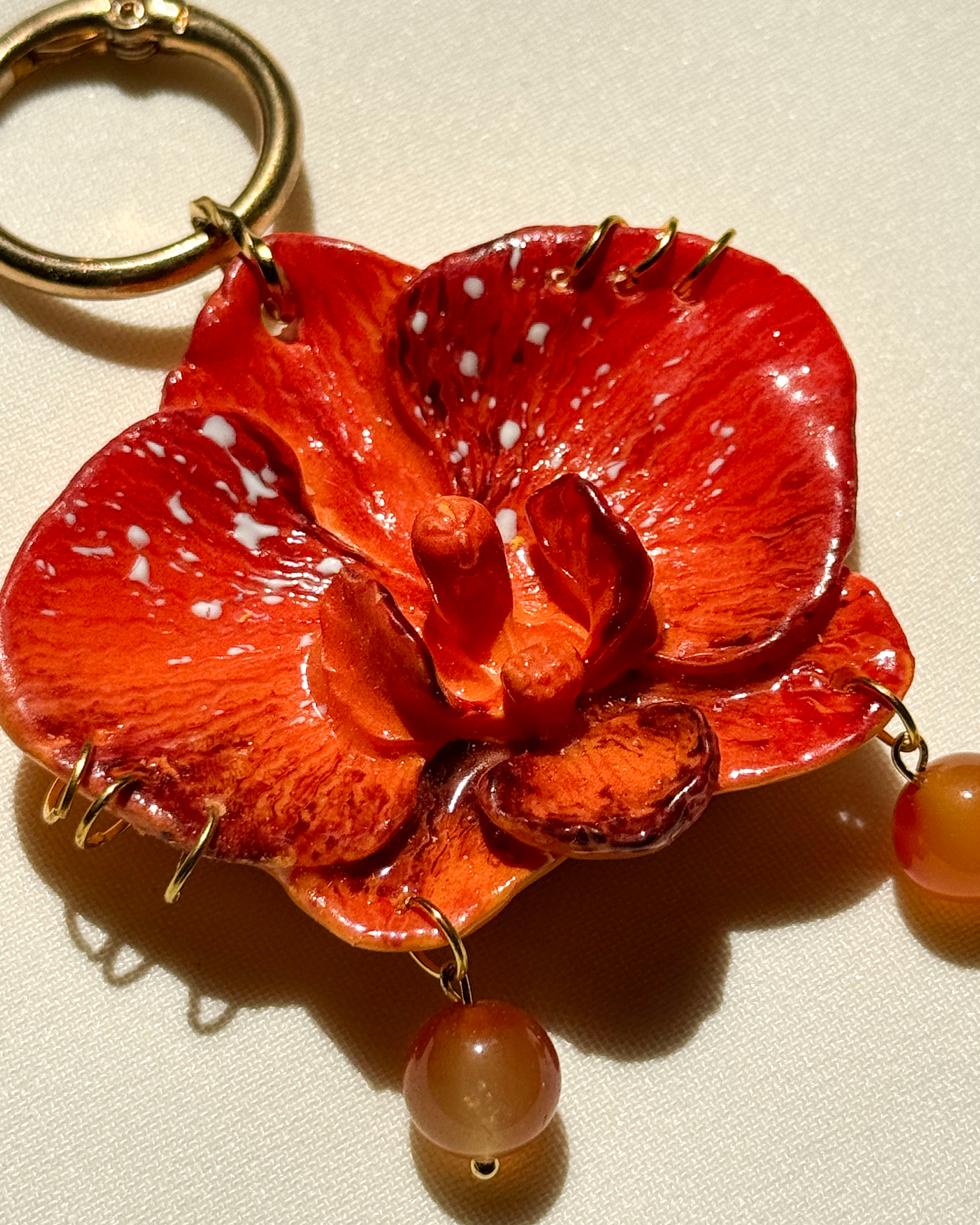 Narancs Orchidea Táskadísz