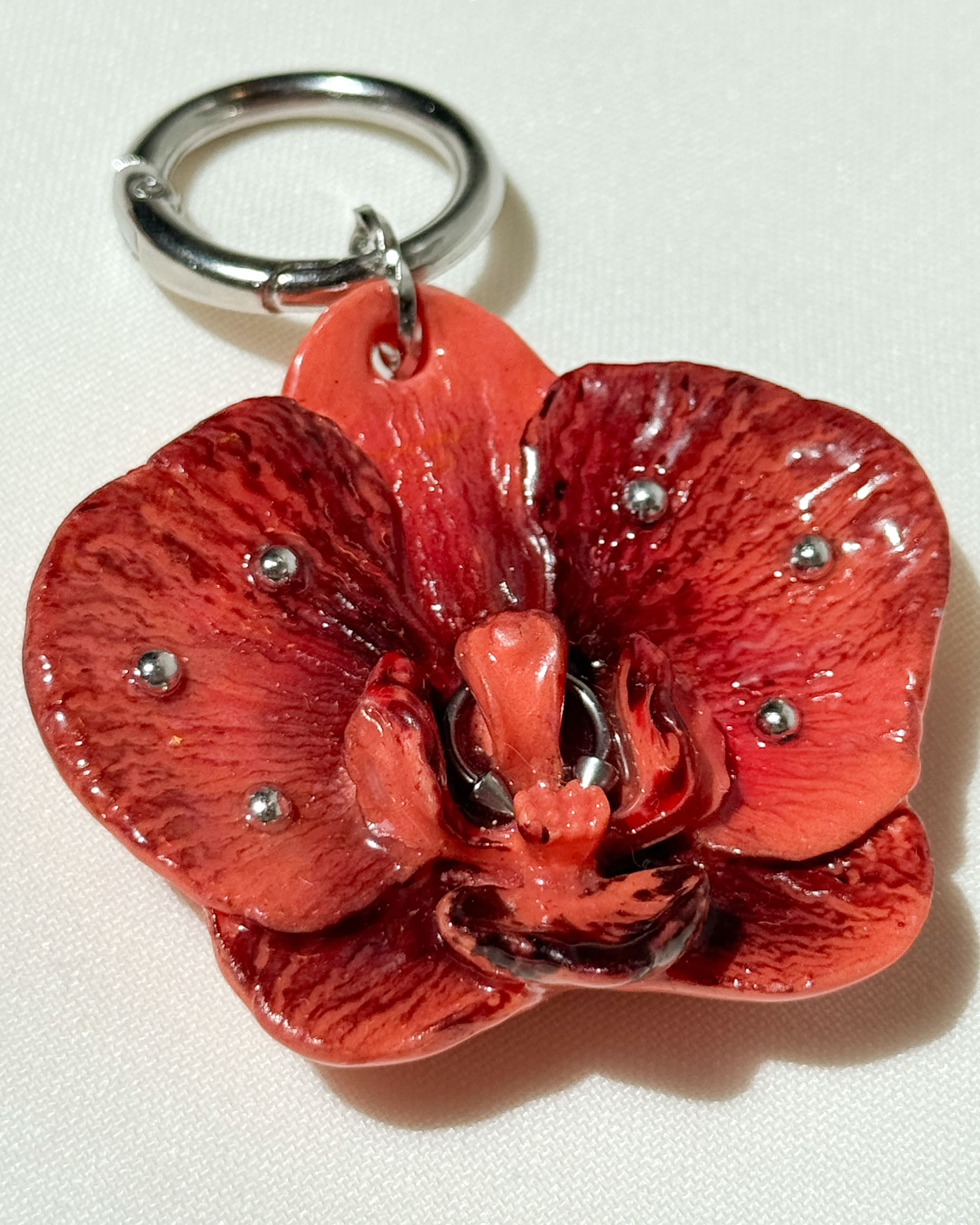 Narancs Orchidea Táskadísz