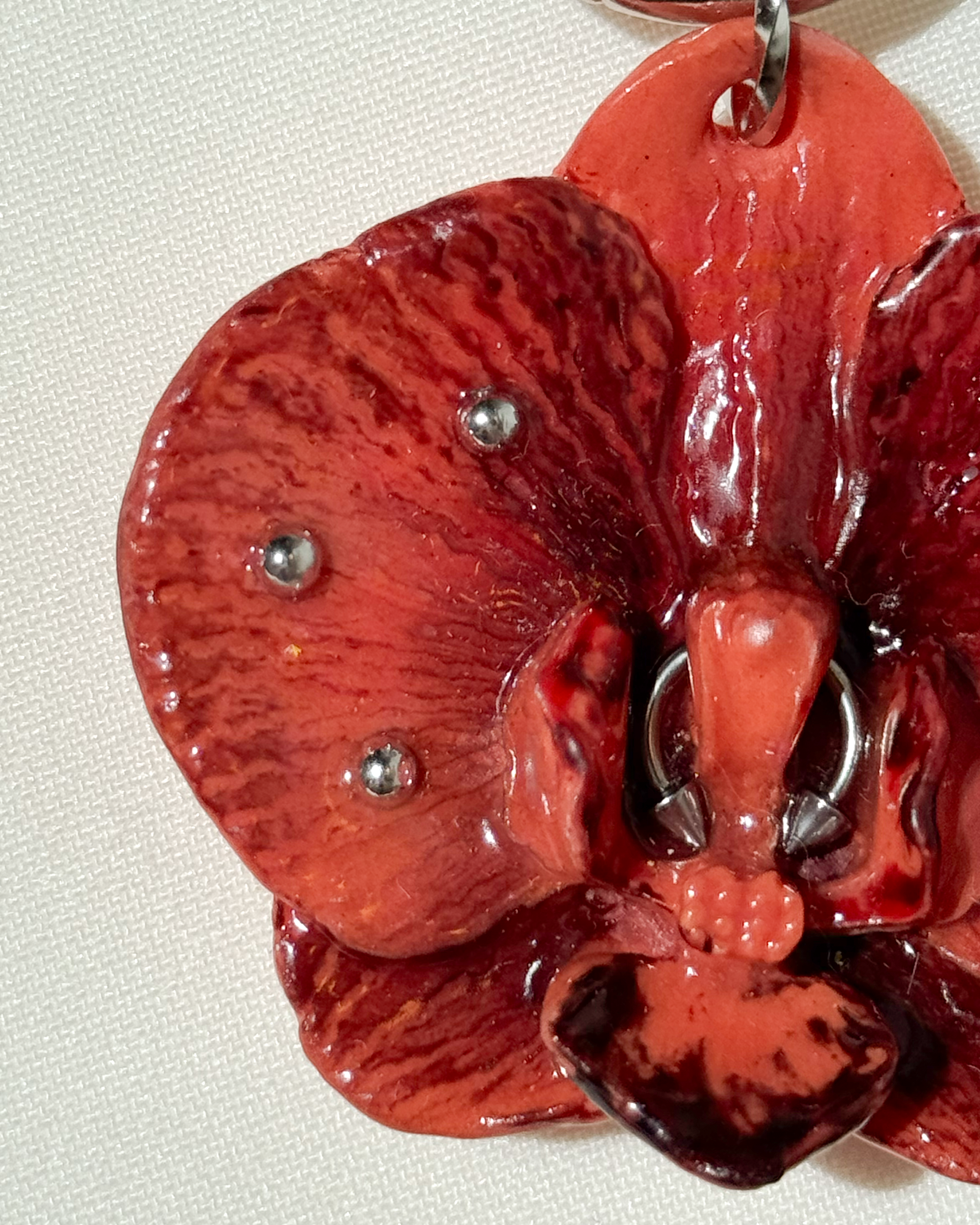 Narancs Orchidea Táskadísz